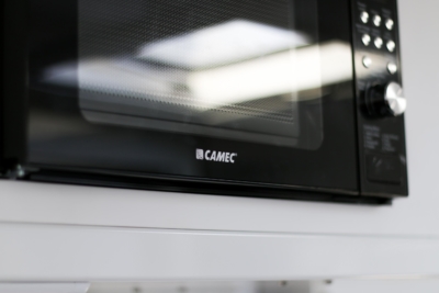 microwave in the overhead cupboard.